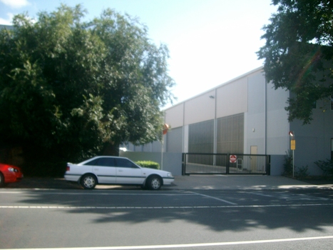 View of driveway on to Stubbs Street with closed gate