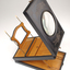 1 wooden box with fold out top and inset glass magnifier.