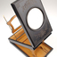1 wooden box with fold out top and inset glass magnifier.