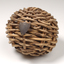 Braided wicker in ball shape with miniature metal shield attached