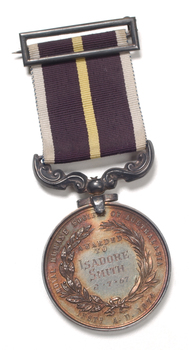 Silver medal hanging from burgundy ribbon