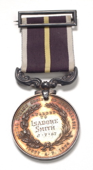 Silver medal hanging from burgundy ribbon