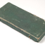 Rectangular box covered in green cloth