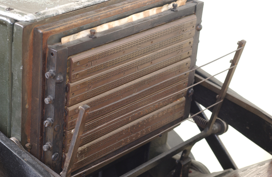 Braille plates attached to the steel and cast iron printing press