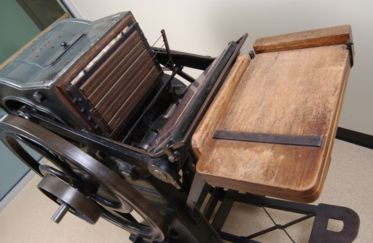 Braille plates attached to the steel and cast iron printing press