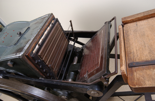 Braille plates attached to the steel and cast iron printing press