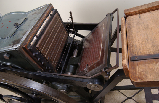 Braille plates attached to the steel and cast iron printing press
