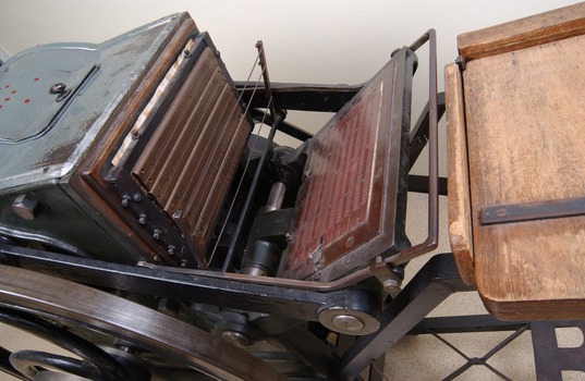 Braille plates attached to the steel and cast iron printing press