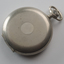 Outer case of watch with pattern and flat circle in centre