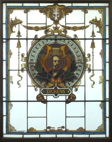 Three animals holding a shield featuring an image of Charles Dickens