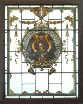 Three animals holding a shield featuring an image of Sir Walter Scott