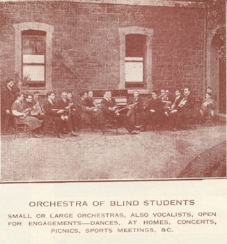 Group of musicians sits outside entrance to RVIB building with instruments in hand