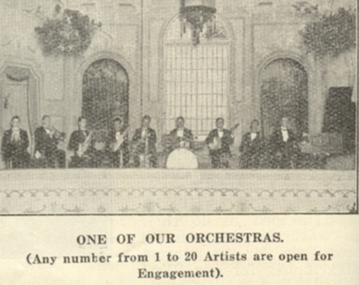 Orchestra playing on stage at Ormond Hall