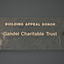 Stippled green tinted glass plaques with names.