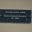 Stippled green tinted glass plaques with names 