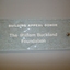 Stippled green tinted glass plaques with names 