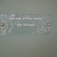 Stippled green tinted glass plaques with names 