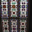 Six circles surrounded by flowers and decorative patterns