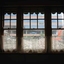 View through windows at Raleigh Street towards multi-level car park