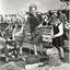 Mrs Tutton planting a tree at Burwood with school children