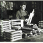 Man placing brushes into packaging