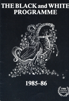 White drawing on black background of lady in dress on horse surrounded by flowers