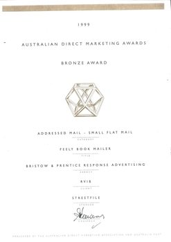 Cream paper with bronze line at top and multi-facet shape with black writing