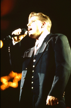 David Dixon singing on stage