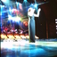 Unknown female singer performing on stage