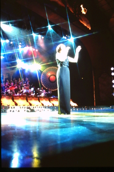 Unknown female singer performing on stage