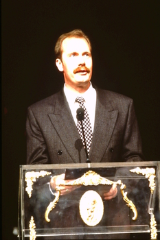 Unknown man speaking to audience