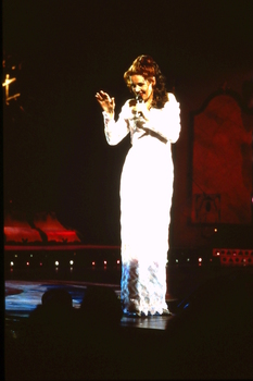 Unknown female singing on stage
