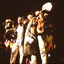 Humphrey B Bear joins Peter Cupples and others during a song