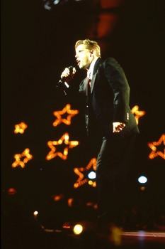 Singer David Dixon performing on stage