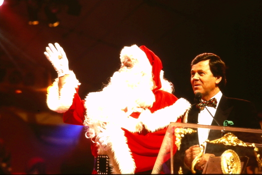Santa and Ray Martin on stage