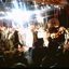 Performers covered in streamers on the stage at the end of the show