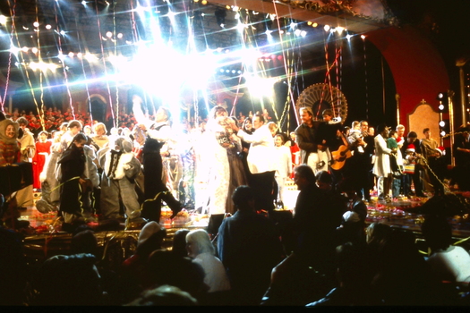 Performers covered in streamers on the stage at the end of the show