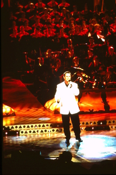 Unknown male singer on stage at Carols