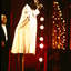 Venetta Fields singing on stage whilst Lyndsay Field looks on
