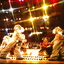 Kids dressed as koalas (or possibly puppies) perform on stage