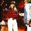 Jo Beth Taylor singing on stage with Peter Cupples