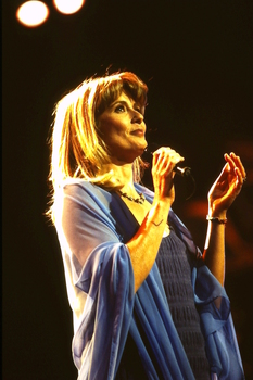 Debra Byrne on stage for Carols rehearsal