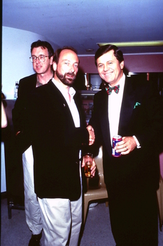 Ray Martin shaking hands with bearded man