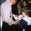 Ray Martin with Rebecca Gibney and Jack Jones looking on
