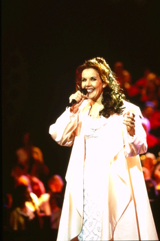 Rhonda Burchmore on stage at Carols