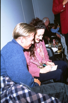 Marina Prior backstage signs an autograph