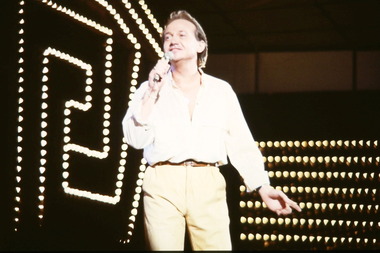 Donald Cant on stage at Carols