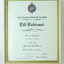 White paper with crest and black writing - Adrienne Mursell