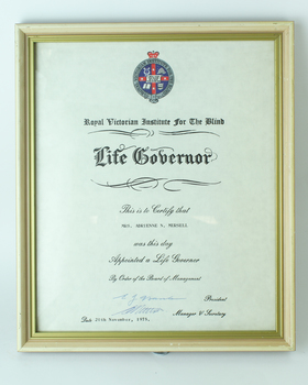 White paper with crest and black writing - Adrienne Mursell