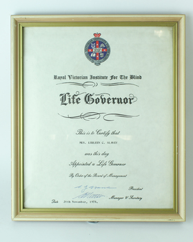 White paper with crest and black writing - Lurleen C Slaney
